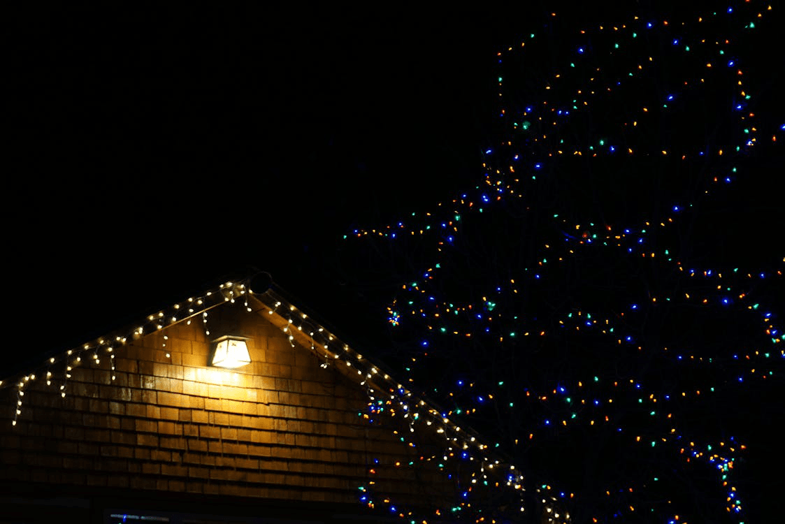 A roof with Christmas lights