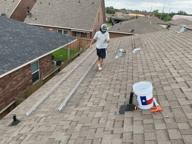 A professional roofing crew from AMC Roofs performing a careful roof inspection