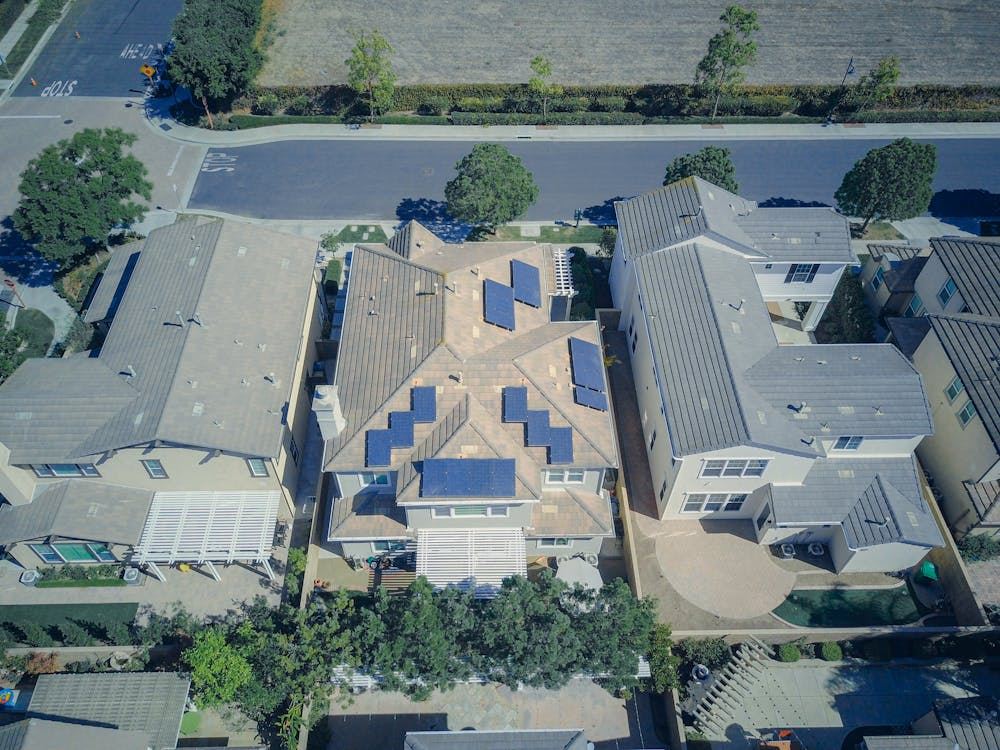 Rooftop solar panels on a modern suburban home